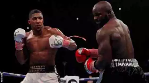 BREAKING NEWS!! Anthony Joshua Beats Carlos Takam In Cardiff To Defend World Heavyweight Titles
